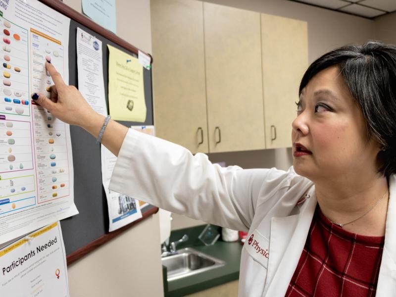 Dr. Michelle Salvaggio, medical director of the Infectious Diseases Institute at the University of Oklahoma Health Sciences Center in Oklahoma City, points to drugs used to treat HIV/AIDS. Medical advancements since the epidemic surfaced in the 1980s have Dr. Michelle Salvaggio, medical director of the Infectious Diseases Institute at the University of Oklahoma Health Sciences Center in Oklahoma City, points to drugs used to treat HIV/AIDS. Medical advancements since the epidemic surfaced in the 1980s have