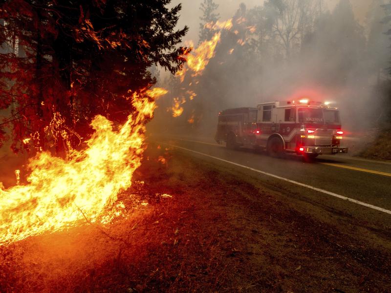 A firetruck drives along state Highway 168 last month while battling the Creek Fire in the Shaver Lake community of Fresno County, Calif. A firetruck drives along state Highway 168 last month while battling the Creek Fire in the Shaver Lake community of Fresno County, Calif.