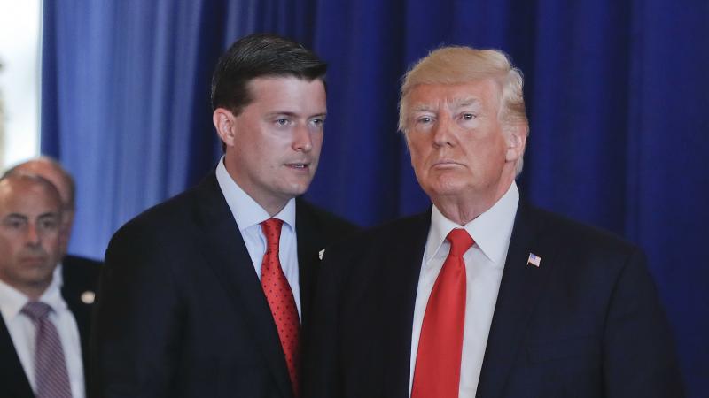 Ousted White House staff secretary Rob Porter speaks to President Trump after remarks he made on violence in Charlottesville, Va., in August 2017 at Trump National Golf Club in Bedminister, N.J. Ousted White House staff secretary Rob Porter speaks to President Trump after remarks he made on violence in Charlottesville, Va., in August 2017 at Trump National Golf Club in Bedminister, N.J.