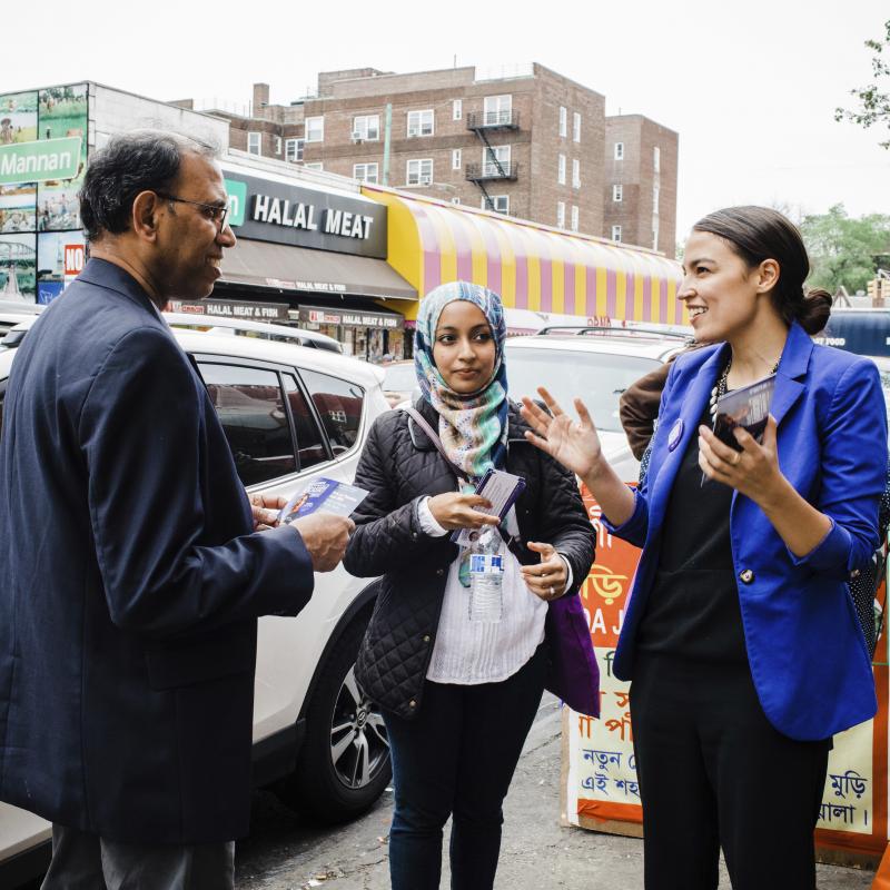 A May 2016 photo provided by the Alexandria Ocasio-Cortez campaign shows the candidate during a Bengali community outreach event in New York. A May 2016 photo provided by the Alexandria Ocasio-Cortez campaign shows the candidate during a Bengali community outreach event in New York.