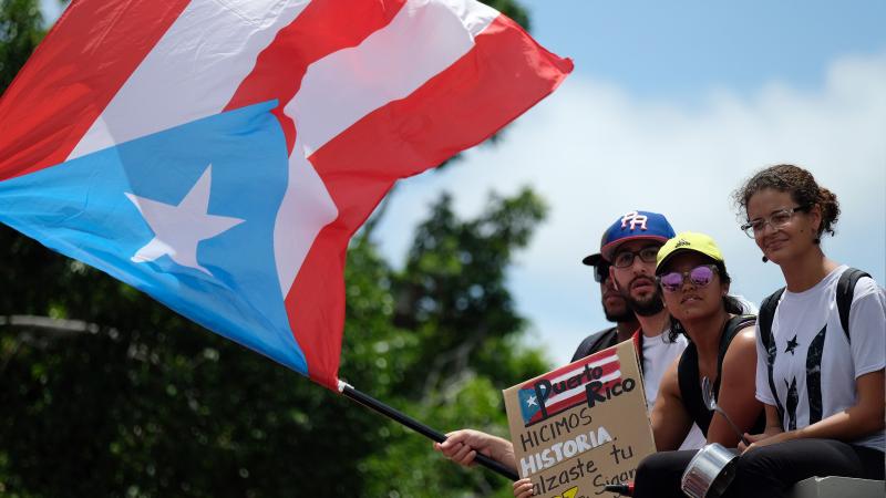 Demonstrators took to the streets Friday, a day after Puerto Rico Gov. Ricardo Rosselló announced he would resign. It is unclear who will take his place. Demonstrators took to the streets Friday, a day after Puerto Rico Gov. Ricardo Rosselló announced he would resign. It is unclear who will take his place.
