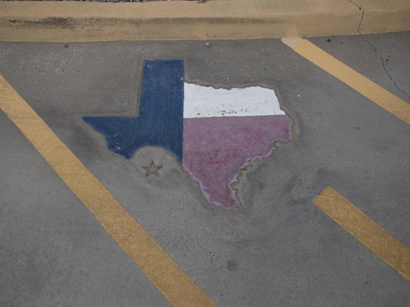 A map of Texas is displayed on a parking spot at the Old Glory Memorial in El Paso, Texas, last year. A map of Texas is displayed on a parking spot at the Old Glory Memorial in El Paso, Texas, last year.