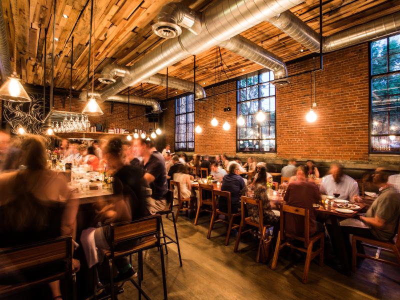 Rolf and Daughters, in Nashville, Tenn., boasts exposed brick, bare bulbs and ceiling pipes. Rolf and Daughters, in Nashville, Tenn., boasts exposed brick, bare bulbs and ceiling pipes.