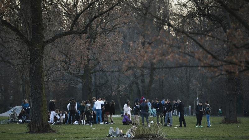 Young people gather in the Volkspark am Friedrichshain in Berlin on March 18. Germany's fatality rate so far — just 0.5% — is the world's lowest, by a long shot. Young people gather in the Volkspark am Friedrichshain in Berlin on March 18. Germany's fatality rate so far — just 0.5% — is the world's lowest, by a long shot.