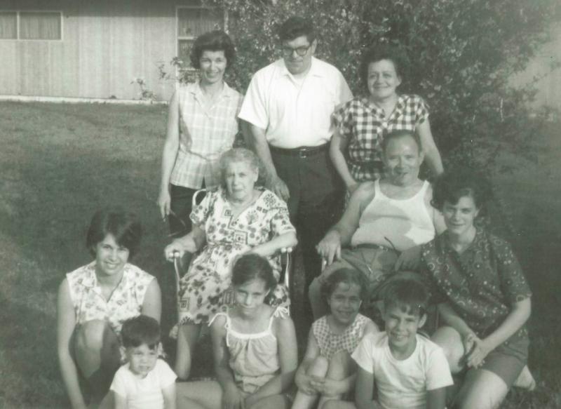 Howard Berkes (seated, front row right) volunteered to be part of a COVID-19 research study this year. He says his family, photographed here in the 1960s, had a history of stepping up during difficult times. That includes his grandparents (in middle), who Howard Berkes (seated, front row right) volunteered to be part of a COVID-19 research study this year. He says his family, photographed here in the 1960s, had a history of stepping up during difficult times. That includes his grandparents (in middle), who