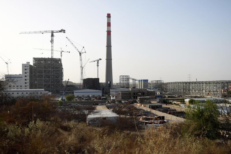 A Chinese-backed power plant under construction in 2018 in the desert in the Tharparkar district of Pakistan's southern Sindh province. A Chinese-backed power plant under construction in 2018 in the desert in the Tharparkar district of Pakistan's southern Sindh province.