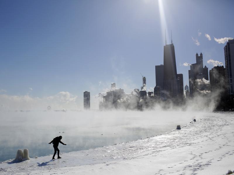 Frigid temperatures arrived in the Upper Midwest with a polar vortex. In Chicago on Wednesday, Marius Radoi walked along a freezing Lake Michigan. Frigid temperatures arrived in the Upper Midwest with a polar vortex. In Chicago on Wednesday, Marius Radoi walked along a freezing Lake Michigan.