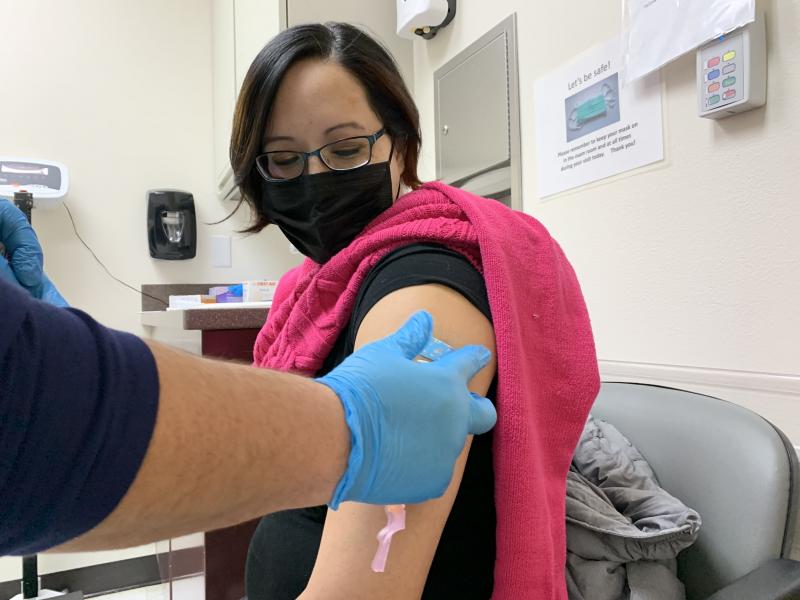 Amanda Bordeaux, 36, gets her second dose of the Pfizer vaccine during a weekly mass vaccination clinic at the Rosebud hospital in South Dakota. Amanda Bordeaux, 36, gets her second dose of the Pfizer vaccine during a weekly mass vaccination clinic at the Rosebud hospital in South Dakota.