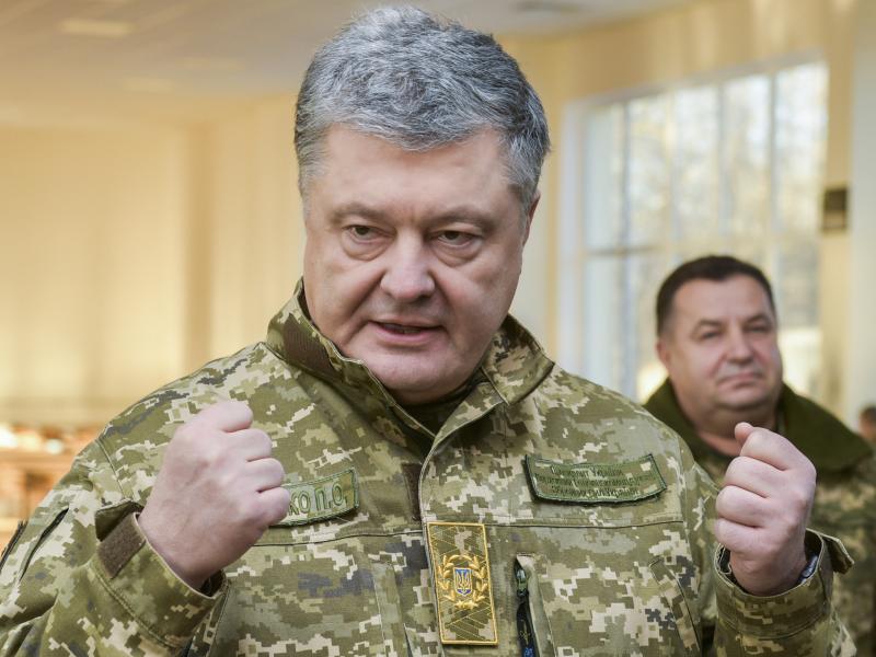 Ukrainian President Petro Poroshenko speaks to soldiers during a visit to a military base in Chernihiv region, Ukraine, on Wednesday. Russia and Ukraine traded blame after Russian border guards on Sunday opened fire on three Ukrainian navy vessels and eve Ukrainian President Petro Poroshenko speaks to soldiers during a visit to a military base in Chernihiv region, Ukraine, on Wednesday. Russia and Ukraine traded blame after Russian border guards on Sunday opened fire on three Ukrainian navy vessels and eve