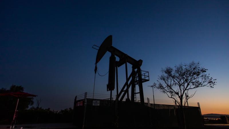 Producers have kept pumping oil, even if they're not making money, partly because wells — once shut down — can be difficult to get back up and running. Here, a pump jack operates at Willow Springs Park in Long Beach, Calif. Producers have kept pumping oil, even if they're not making money, partly because wells — once shut down — can be difficult to get back up and running. Here, a pump jack operates at Willow Springs Park in Long Beach, Calif.