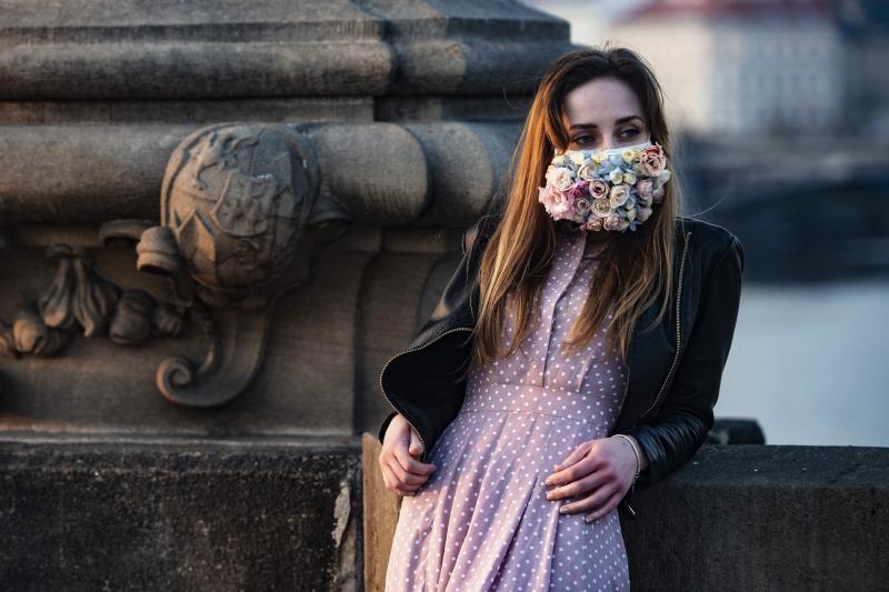 A do-it-yourself mask culture is springing up in the Czech Republic. This woman was photographed on the Charles Bridge in Prague on March 28. A do-it-yourself mask culture is springing up in the Czech Republic. This woman was photographed on the Charles Bridge in Prague on March 28.