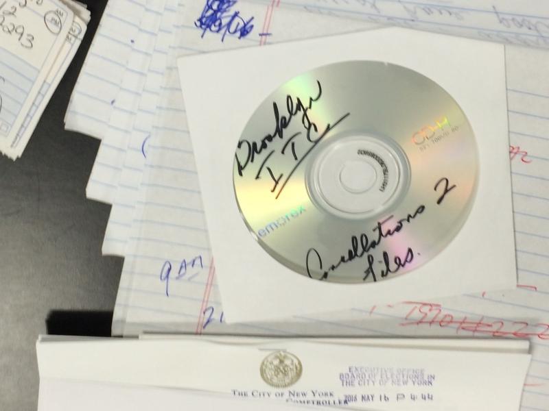 A CD-Rom containing two spreadsheets with names that New York City Board of Elections officials say were purged from voter rolls. A CD-Rom containing two spreadsheets with names that New York City Board of Elections officials say were purged from voter rolls.