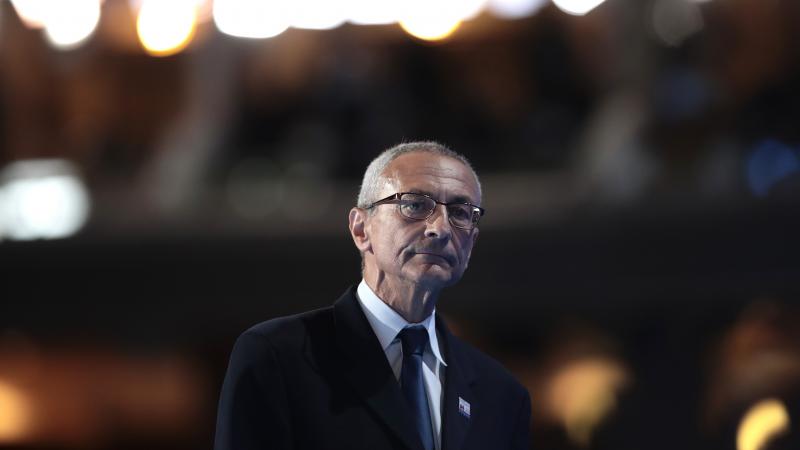 John Podesta walks off stage after delivering a speech on the first day of the Democratic National Convention July 25 in Philadelphia. John Podesta walks off stage after delivering a speech on the first day of the Democratic National Convention July 25 in Philadelphia.