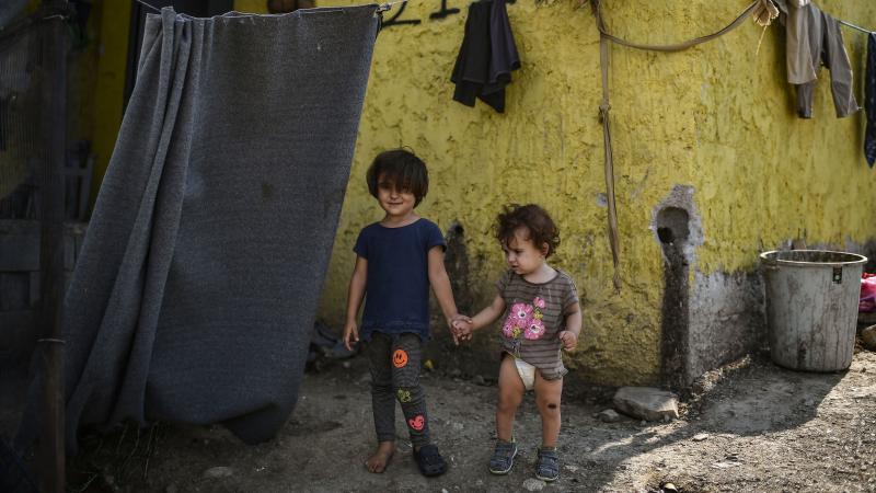 A wildfire raged near the Moria refugee camp, pictured here, on Greece's Lesbos Island. The camp is home to an estimated 9,000 migrants and refugees. A wildfire raged near the Moria refugee camp, pictured here, on Greece's Lesbos Island. The camp is home to an estimated 9,000 migrants and refugees.