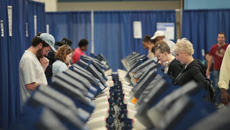 Chicago residents cast early ballots on Tuesday for the Nov. 8 election. Chicago residents cast early ballots on Tuesday for the Nov. 8 election.
