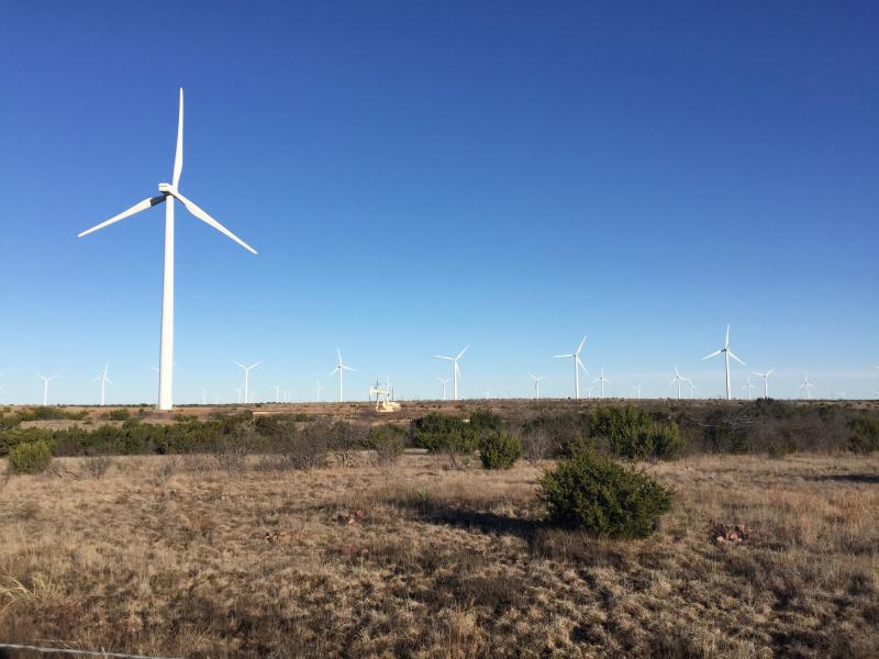 Part of one of the world's biggest renewable energy systems, wind turbines dot the landscape on the edge of Sweetwater, Texas, along with a pump jack pulling up oil. Part of one of the world's biggest renewable energy systems, wind turbines dot the landscape on the edge of Sweetwater, Texas, along with a pump jack pulling up oil.