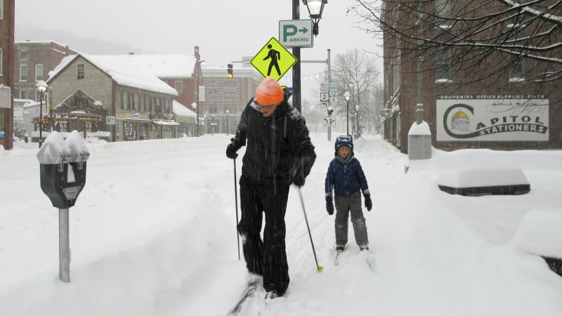 Nicholas Nicolet and his son Rocco cross-country ski on Sunday in Montpelier, Vt. A major winter storm hit the Midwest and New England this weekend. Nicholas Nicolet and his son Rocco cross-country ski on Sunday in Montpelier, Vt. A major winter storm hit the Midwest and New England this weekend.