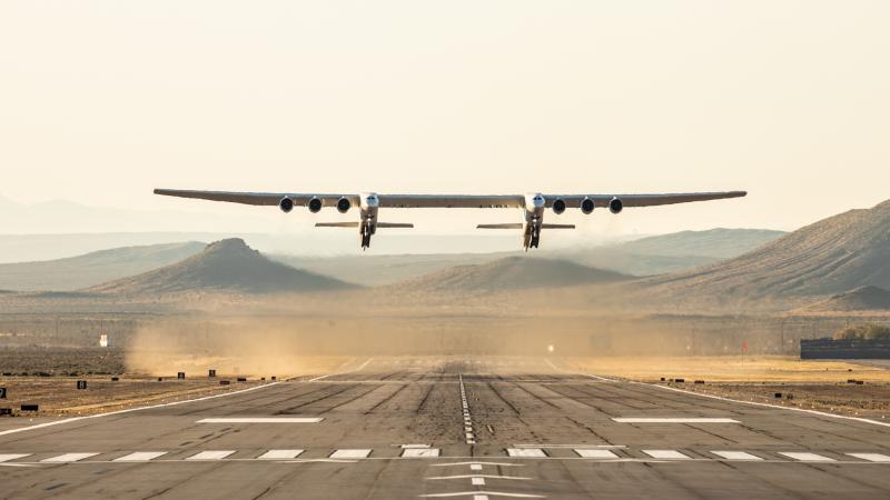 The Stratolaunch — the world's largest plane by wingspan — took its first flight on Saturday above the Mojave Desert in California. The Stratolaunch — the world's largest plane by wingspan — took its first flight on Saturday above the Mojave Desert in California.