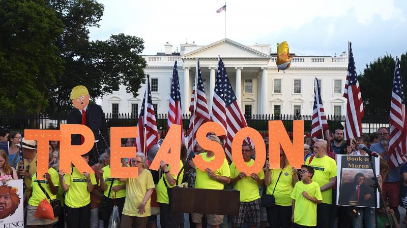 Members of Virginia's Herndon-Reston Indivisible group protest in front of the White House on Aug. 6, 2018. With Donald Trump out of office, progressive groups are turning their focus. Members of Virginia's Herndon-Reston Indivisible group protest in front of the White House on Aug. 6, 2018. With Donald Trump out of office, progressive groups are turning their focus.