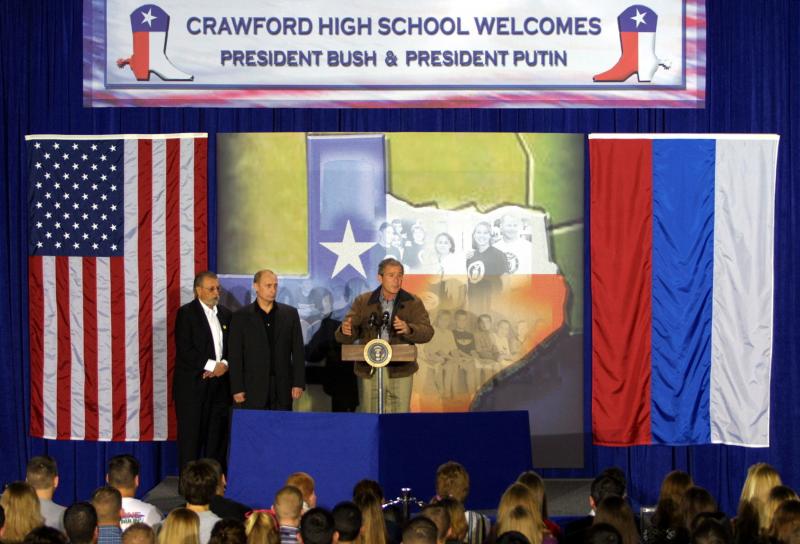 President George W. Bush and Russian President Vladimir Putin speak during a visit to Crawford High School in Crawford, Texas, on Nov. 15, 2001. The appearance wrapped up a summit of the newly elected presidents in Texas. President George W. Bush and Russian President Vladimir Putin speak during a visit to Crawford High School in Crawford, Texas, on Nov. 15, 2001. The appearance wrapped up a summit of the newly elected presidents in Texas.