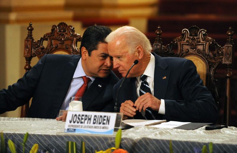 Honduran President Juan Orlando Hernández (left) speaks with then-Vice President Biden during a news conference in Guatemala City on March 2, 2015. Leaders from Guatemala, El Salvador and Honduras were meeting with Biden for two days of talks about child Honduran President Juan Orlando Hernández (left) speaks with then-Vice President Biden during a news conference in Guatemala City on March 2, 2015. Leaders from Guatemala, El Salvador and Honduras were meeting with Biden for two days of talks about child