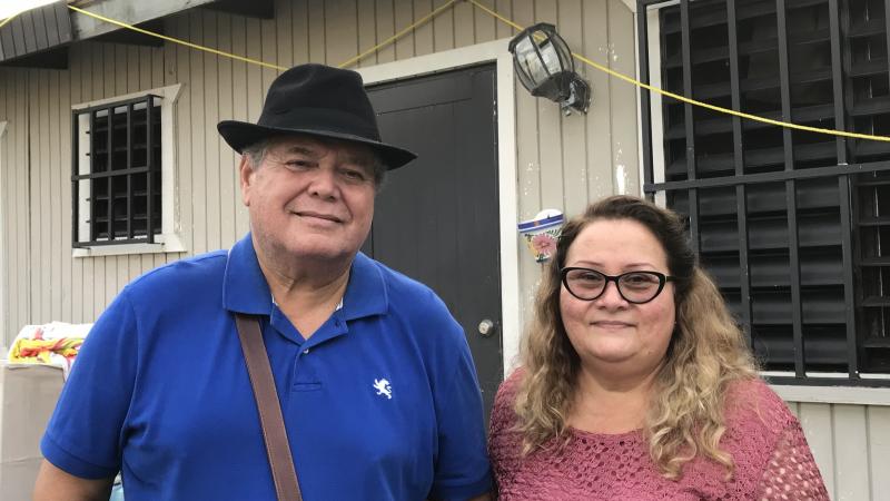 Irma Rivera Aviles and her husband Ivan Martínez stand in front of their home last month. Rivera Aviles was ecstatic about the restoration of power to her neighborhood last Friday. Irma Rivera Aviles and her husband Ivan Martínez stand in front of their home last month. Rivera Aviles was ecstatic about the restoration of power to her neighborhood last Friday.