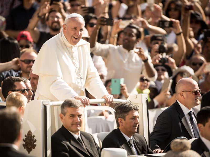 Pope Francis arrives for his weekly general audience in St. Peter's Square on Wednesday. Pope Francis arrives for his weekly general audience in St. Peter's Square on Wednesday.