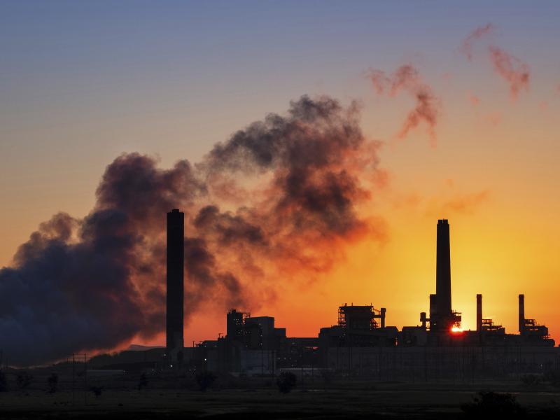 In this July 27, 2018 photo, the Dave Johnson coal-fired power plant is silhouetted against the morning sun in Glenrock, Wyo. In this July 27, 2018 photo, the Dave Johnson coal-fired power plant is silhouetted against the morning sun in Glenrock, Wyo.