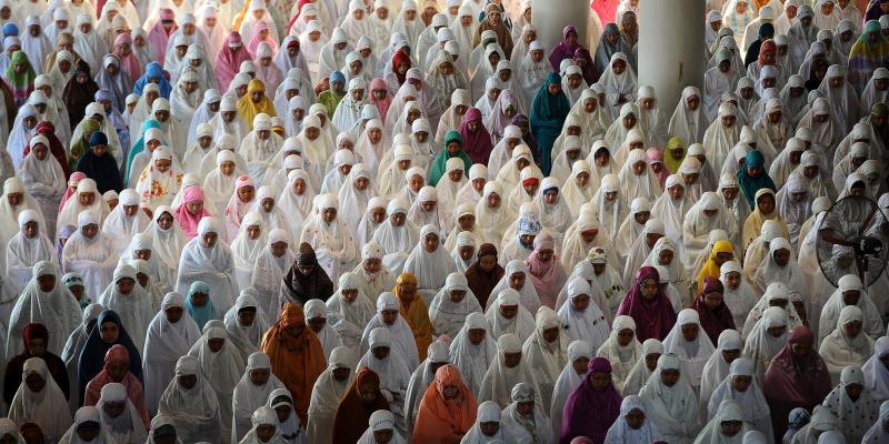 Indonesian Muslims perform Eid Al-Adha prayer at Al-Akbar Mosque in Oct. 2014 in Surabaya, Indonesia. Indonesian Muslims perform Eid Al-Adha prayer at Al-Akbar Mosque in Oct. 2014 in Surabaya, Indonesia.
