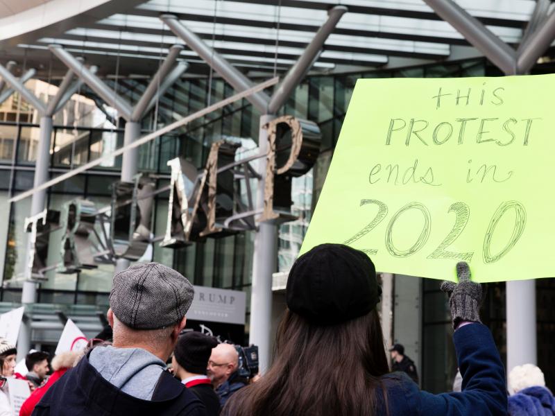 Approval of U.S. leadership fell sharply in President Trump's first year — particularly in Canada, where the approval rating fell from 60 percent to 20 percent. In this photo, protesters demonstrate at a new Trump International hotel in Vancouver last y Approval of U.S. leadership fell sharply in President Trump's first year — particularly in Canada, where the approval rating fell from 60 percent to 20 percent. In this photo, protesters demonstrate at a new Trump International hotel in Vancouver last y