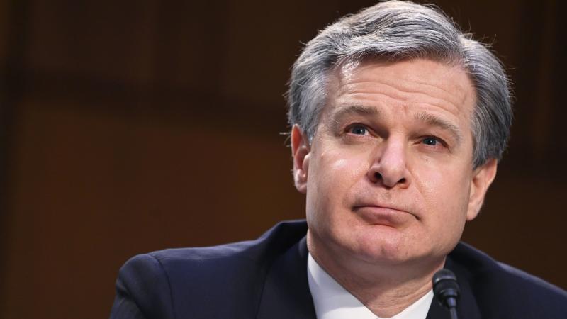 FBI Director Christopher Wray testifies on Tuesday before the Senate Judiciary Committee about the Jan. 6 insurrection at the Capitol. FBI Director Christopher Wray testifies on Tuesday before the Senate Judiciary Committee about the Jan. 6 insurrection at the Capitol.