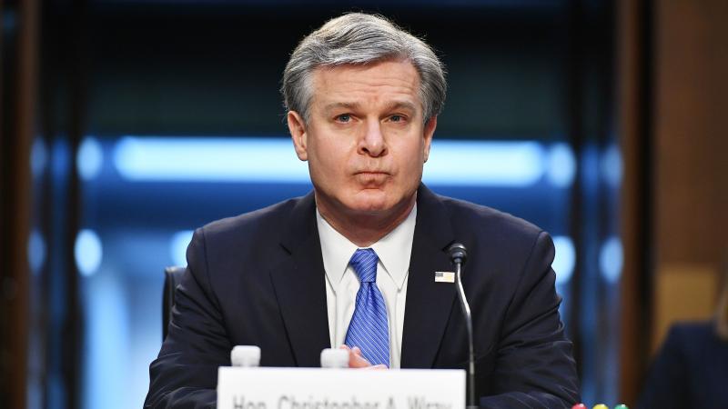 FBI Director Christopher Wray arrives Tuesday to testify before the Senate Judiciary Committee regarding the Jan. 6 insurrection at the Capitol. FBI Director Christopher Wray arrives Tuesday to testify before the Senate Judiciary Committee regarding the Jan. 6 insurrection at the Capitol.