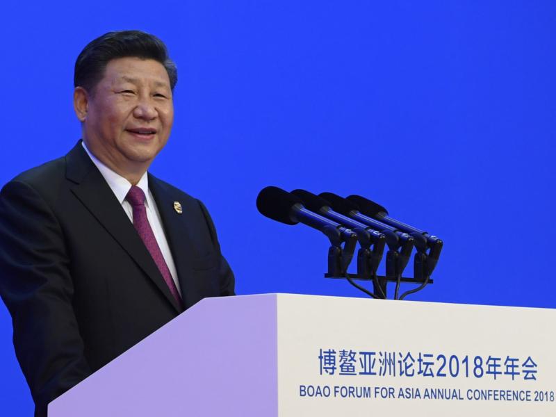 In this photo released by Xinhua News Agency, Chinese President Xi Jinping delivers his opening speech at the Boao Forum for Asia Annual Conference in Boao in south China's Hainan province, on Tuesday. In this photo released by Xinhua News Agency, Chinese President Xi Jinping delivers his opening speech at the Boao Forum for Asia Annual Conference in Boao in south China's Hainan province, on Tuesday.