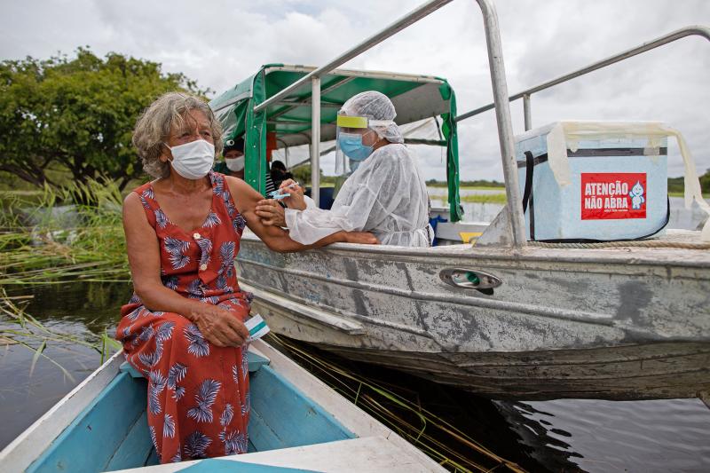 A health worker inoculates 72-year-old Olga D'arc Pimentel with a dose of Oxford-AstraZeneca's COVID-19 vaccine. She lives on the banks of the Rio Negro near Manaus, Brazil. A small study in South Africa has raised concerns about the AstraZeneca vaccine's A health worker inoculates 72-year-old Olga D'arc Pimentel with a dose of Oxford-AstraZeneca's COVID-19 vaccine. She lives on the banks of the Rio Negro near Manaus, Brazil. A small study in South Africa has raised concerns about the AstraZeneca vaccine's