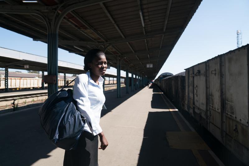 Sidumiso Nyoni, 30, took the train from her home in rural Nyamandhlovu, Zimbabwe, to the industrial city of Bulawayo to visit family. "The train doesn't have a specific time at which it comes," she says. Sidumiso Nyoni, 30, took the train from her home in rural Nyamandhlovu, Zimbabwe, to the industrial city of Bulawayo to visit family. "The train doesn't have a specific time at which it comes," she says.
