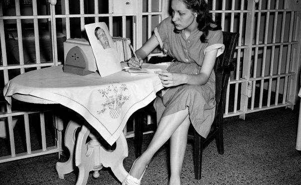 Ruth Ann Steinhagen, then-19, in the Cook County Jail after she shot Philadelphia Phillies first baseman Eddie Waitkus in 1949. On the table: a photo of Waitkus taken in the hospital where he was recovering from his bullet wound. The story of his shooting Ruth Ann Steinhagen, then-19, in the Cook County Jail after she shot Philadelphia Phillies first baseman Eddie Waitkus in 1949. On the table: a photo of Waitkus taken in the hospital where he was recovering from his bullet wound. The story of his shooting