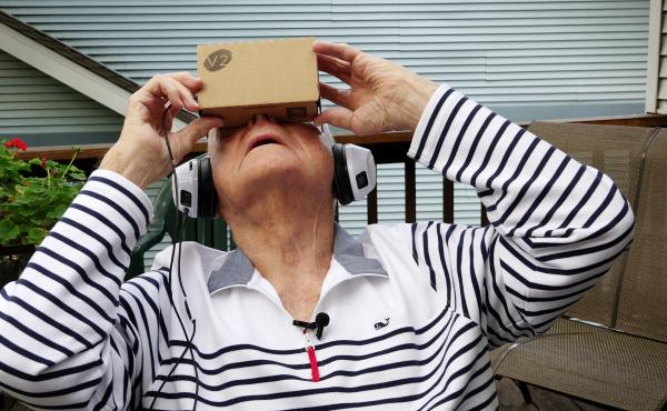 Dale Garrett of Columbia, Mo., a 96-year-old World War II veteran, experiences a trip to a war memorial through virtual reality. Dale Garrett of Columbia, Mo., a 96-year-old World War II veteran, experiences a trip to a war memorial through virtual reality.