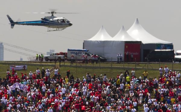 A helicopter carries VIPs to the Brazilian Grand Prix in Sao Paulo in 2010. Politicians taking expensive helicopters and government planes have generated controversy in Brazil. A helicopter carries VIPs to the Brazilian Grand Prix in Sao Paulo in 2010. Politicians taking expensive helicopters and government planes have generated controversy in Brazil.