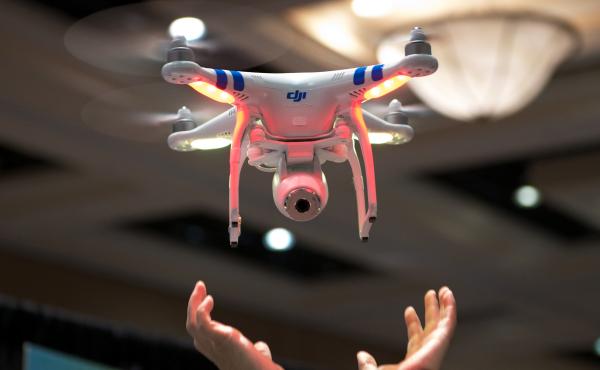 A DJI Phantom 2 flying camera is presented at the media event prior to the International CES show opening in Las Vegas. A DJI Phantom 2 flying camera is presented at the media event prior to the International CES show opening in Las Vegas.