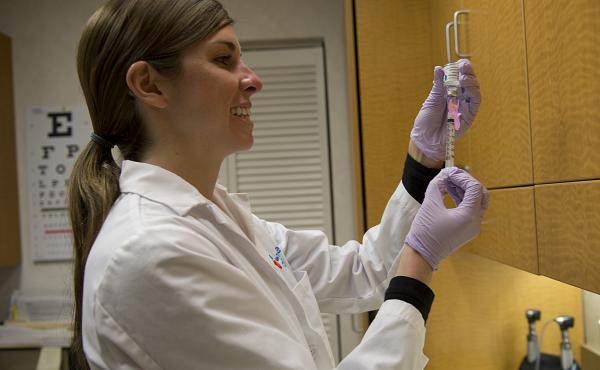 Shea Catlin, a nurse practitioner, doses out flu vaccine to give a shot at a CVS Minute Clinic in Arlington, Va., on Jan. 3. Shea Catlin, a nurse practitioner, doses out flu vaccine to give a shot at a CVS Minute Clinic in Arlington, Va., on Jan. 3.