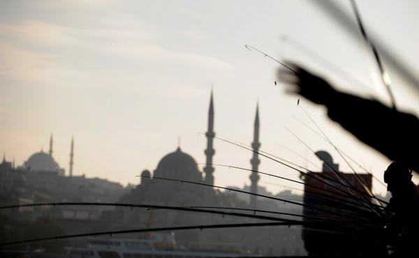 Anglers fish off Galata Bridge in Istanbul in 2011. The bridge is within site of the modest waterside restaurant Akin Balik. Anglers fish off Galata Bridge in Istanbul in 2011. The bridge is within site of the modest waterside restaurant Akin Balik.
