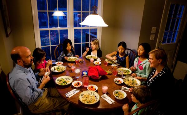 The Brown-Spencer family gathers for dinner at their home in Mechanicsville, Va. This family of eight manages to eat together nearly every weeknight, but they've had to cut back on many after-school activities to make it work. From left: Doug Brown, Laura The Brown-Spencer family gathers for dinner at their home in Mechanicsville, Va. This family of eight manages to eat together nearly every weeknight, but they've had to cut back on many after-school activities to make it work. From left: Doug Brown, Laura