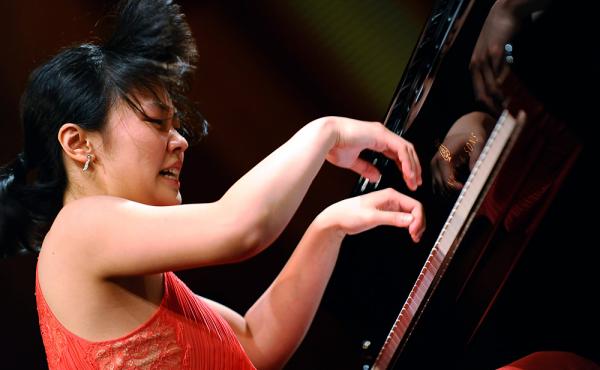 Chinese pianist Fei-Fei Dong, 22, performs at the 14th Van Cliburn International Piano Competition in Fort Worth, Texas. The Juilliard School graduate student is among six musicians chosen for the final round. Chinese pianist Fei-Fei Dong, 22, performs at the 14th Van Cliburn International Piano Competition in Fort Worth, Texas. The Juilliard School graduate student is among six musicians chosen for the final round.