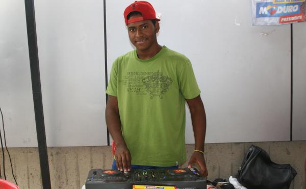 Alvaro Perez volunteers as a DJ at a socialist party stand in Caracas, Venezuela, playing songs in support of candidate Nicolas Maduro. Alvaro Perez volunteers as a DJ at a socialist party stand in Caracas, Venezuela, playing songs in support of candidate Nicolas Maduro.