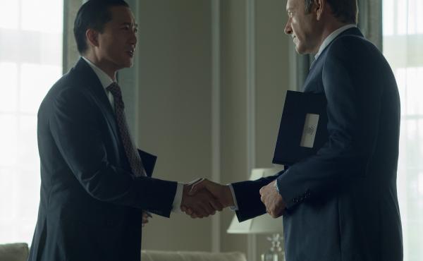 Chinese billionaire Xander Feng, played by Terry Chen, shakes hands with Francis Underwood, played by Kevin Spacey, in Netflix's House of Cards. Chinese billionaire Xander Feng, played by Terry Chen, shakes hands with Francis Underwood, played by Kevin Spacey, in Netflix's House of Cards.