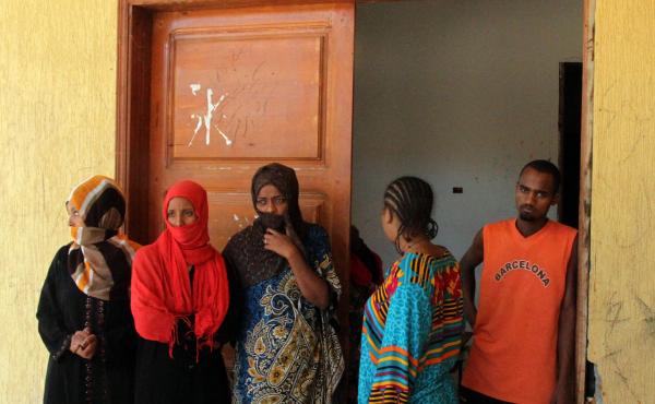 Illegal immigrants captured in the Libyan coastal city of Surman are held at a temporary prison in an eastern district of Tripoli, Libya, on Oct. 19. Illegal immigrants captured in the Libyan coastal city of Surman are held at a temporary prison in an eastern district of Tripoli, Libya, on Oct. 19.