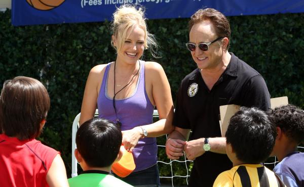 Kate (Malin Akerman) pitches in alongside husband Pete (Bradley Whitford) on her stepson's soccer practice in ABC's Trophy Wife. Kate (Malin Akerman) pitches in alongside husband Pete (Bradley Whitford) on her stepson's soccer practice in ABC's Trophy Wife.