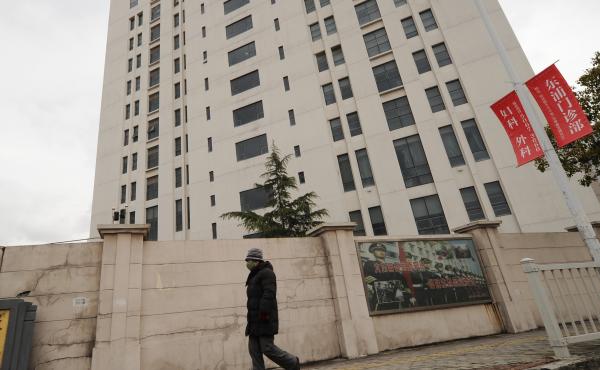 This 12-story building in Shanghai's northern suburb of Gaoqiao allegedly houses a Chinese military-led hacking group. This 12-story building in Shanghai's northern suburb of Gaoqiao allegedly houses a Chinese military-led hacking group.
