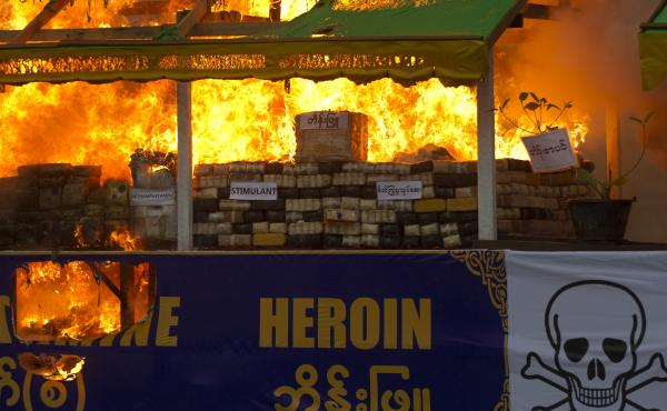 Smokes and flames billow from burning narcotic drugs during a destruction ceremony of seized narcotic drugs in outskirts of Yangon, Myanmar on June 26, 2018. Smokes and flames billow from burning narcotic drugs during a destruction ceremony of seized narcotic drugs in outskirts of Yangon, Myanmar on June 26, 2018.
