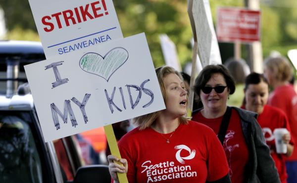 Teachers at West Seattle Elementary School begin walking a picket line Wednesday morning, after last-minute negotiations over wages and other issues failed to avert a strike. Teachers at West Seattle Elementary School begin walking a picket line Wednesday morning, after last-minute negotiations over wages and other issues failed to avert a strike.
